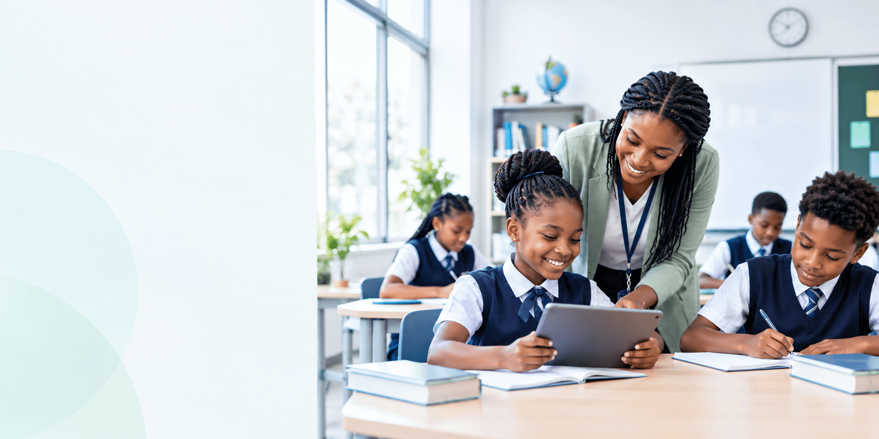 Teacher helping students learn together in a classroom
